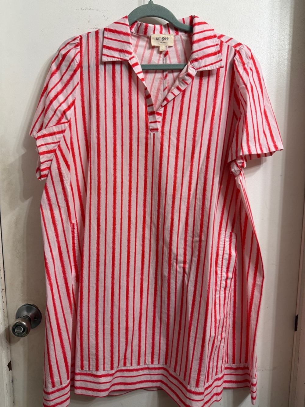 Umgee women’s dress tangerine & White Vertical Stripe with pockets.